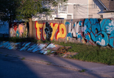 George Floyd graffiti on a fence on 38th Street in George Floyd Square.