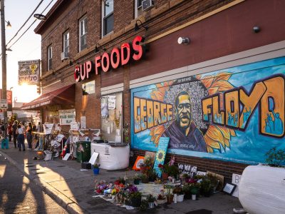 George Floyd Square, Cup Foods Mural and Memorial Flowers at Sunset