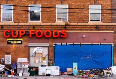 The George Floyd mural on 38th Street covered up after it was vandalized.