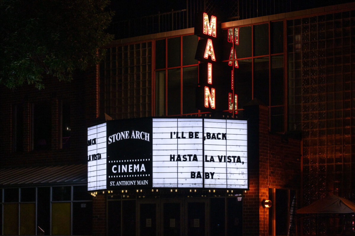 Cinema located at 115 SE Main St. in Minneapolis with "I'll Be Back, Hasta La Vista Baby" on the marquee.