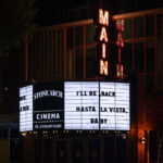 Cinema located at 115 SE Main St. in Minneapolis with "I'll Be Back, Hasta La Vista Baby" on the marquee.