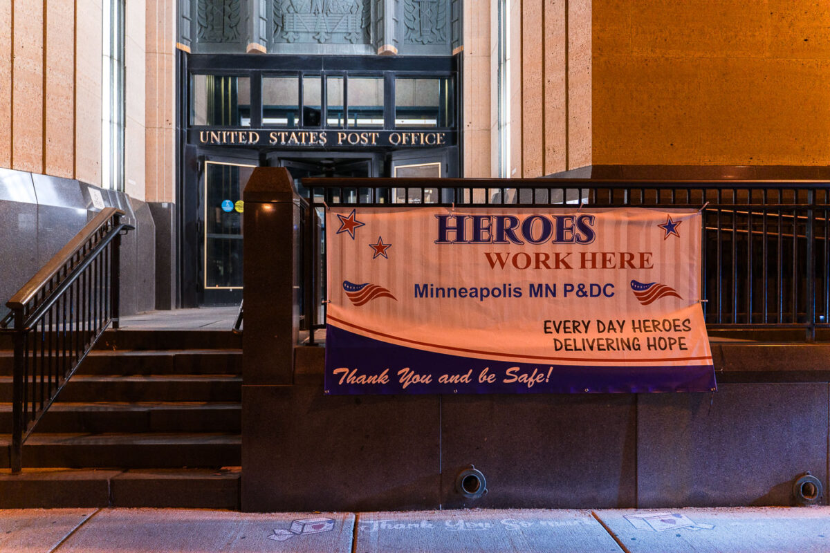 A "Heroes work here" sign at the Main Post Office in Downtown Minneapolis.