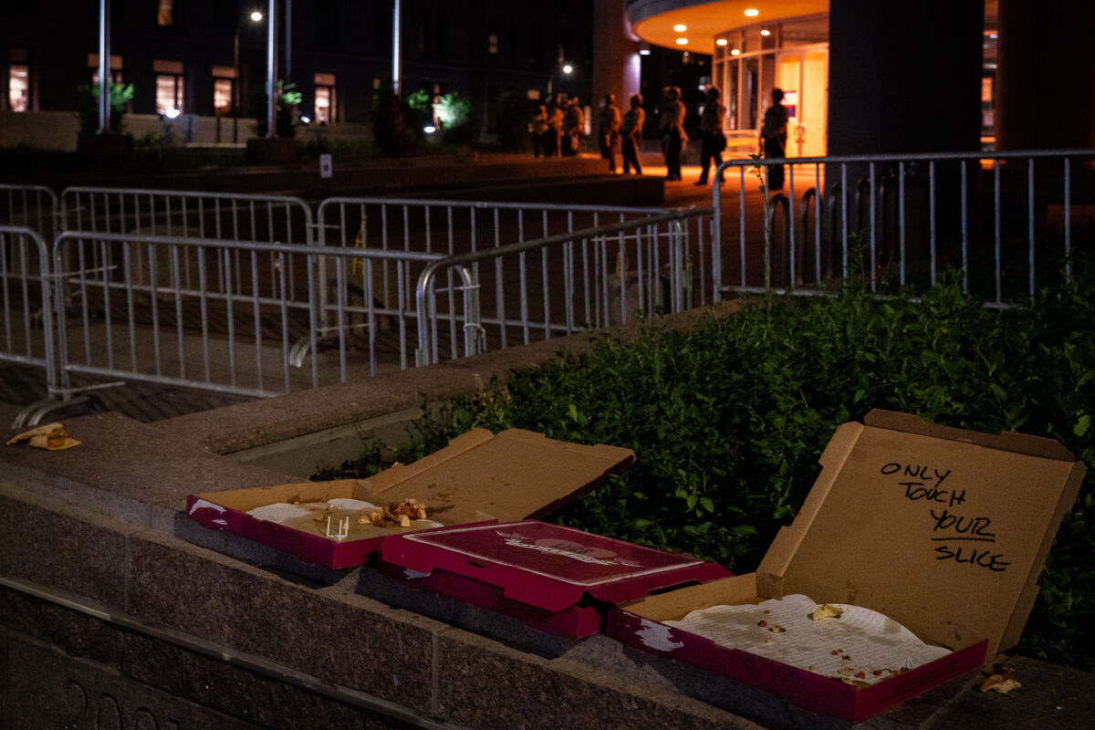 Pizza delivered to protesters outside the Hennepin County Jail in downtown Minneapolis by “jail support” as they demand the release of protesters arrested earlier in the evening. Protesters had marched after Jacob Blake was shot in Kenosha, Wisconsin.