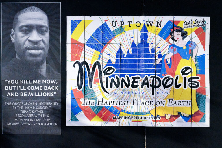Minneapolis The Happiest Place On Earth 3 George Floyd wheat pasting on Hennepin Avenue in Uptown Minneapolis. The stickers from Mapping Prejudice proclaim “Minneapolis The Happiest Place on Earth”.