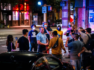 Minneapolis 1st Precinct Inspector Peterson with protesters