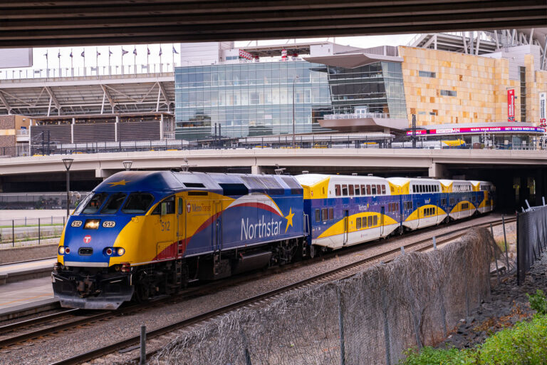 Northstar Train at Target Field Station, Minneapolis 4 The Northstar Train at the Target Field Station in Minneapolis. Above is Target Field, home of the Minnesota Twins MLB baseball team. COVID-19 warnings scroll on the digital board.