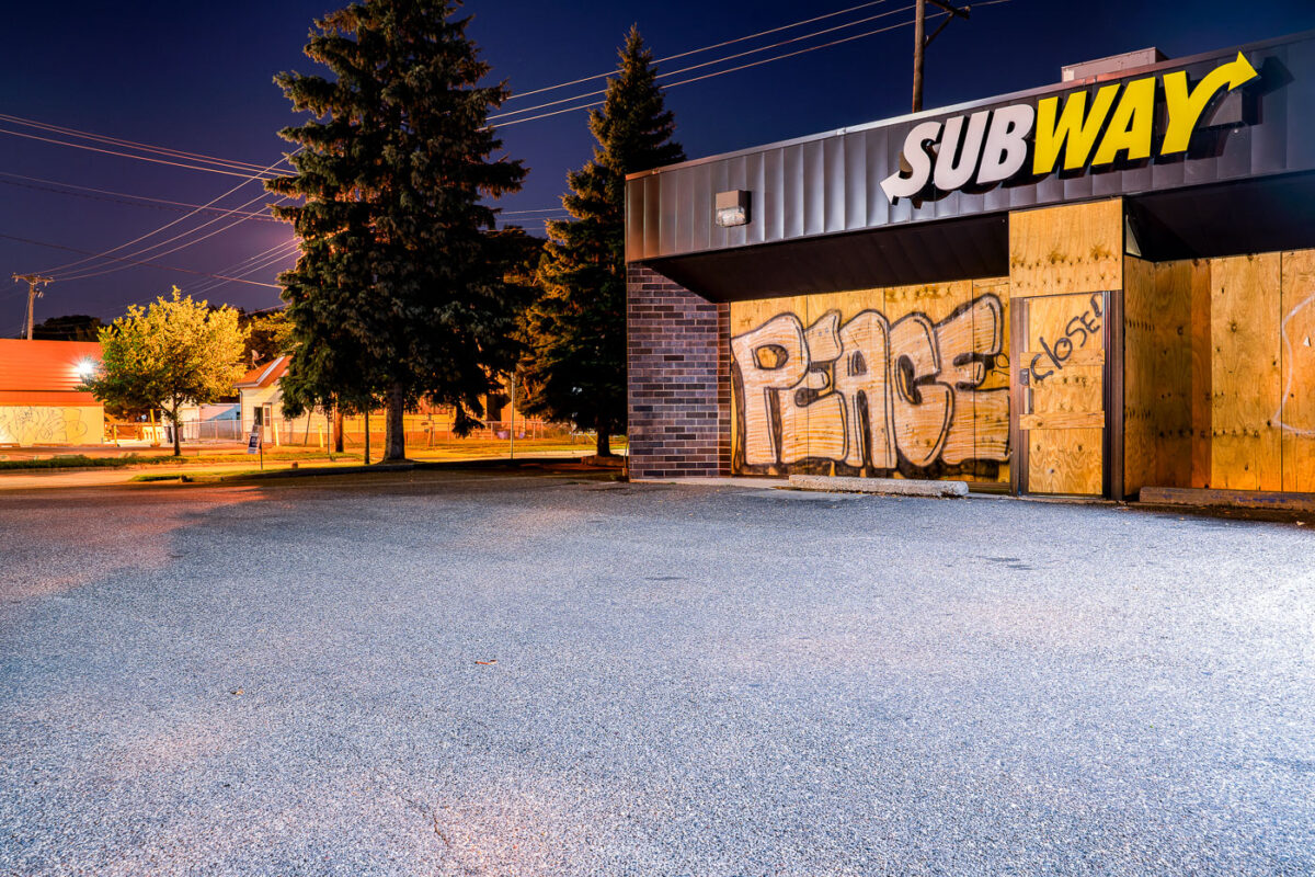 Subway on East Lake Street. Boarded up since protests following the May 25th, 2020 death of George Floyd.