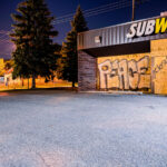 Subway on East Lake Street. Boarded up since protests following the May 25th, 2020 death of George Floyd.
