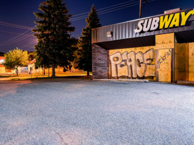 PEACE on boarded windows of Subway, East Lake Street, Minneapolis