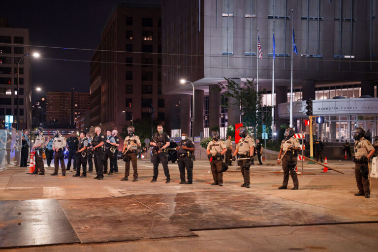 Officers surrounded jail in Downtown Minneapolis 1 Hennepin County Sheriff's Officers guarding the Hennepin County Jail in downtown Minneapolis. Protesters were gathered after a dozen protesters were arrested following a large march downtown in solidarity with Jacob Blake.