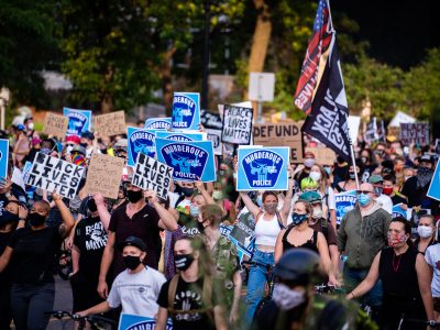 Downtown Minneapolis March: Murderous Police Signs