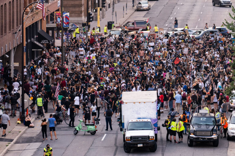 Protesters outside the Minneapolis Police 1st precinct station 4 Protesters march in downtown Minneapolis outside the Minneapolis Police 1st precinct police station demanding justice for Jacob Blake who was shot by Kenosha Police.