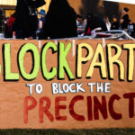 Protesters gather at a "Block Party to Block the Precinct" protest to bring awareness and block any potential lease for a new 3rd precinct. The 3rd precinct police station, located a mile away, was burned by protesters after the May 25th, 2020 death of George Floyd.