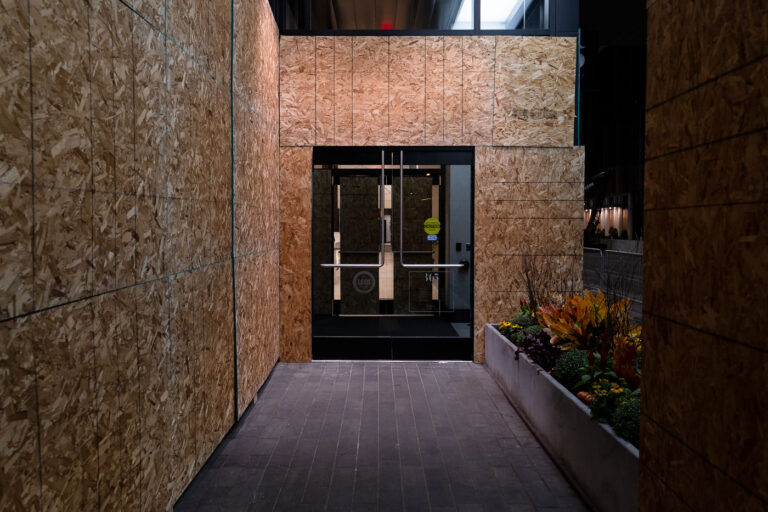 365 Nicollet with boards around the entrance 3 The 365 Nicollet apartment building in downtown Minneapolis boarded following the murder of George Floyd.