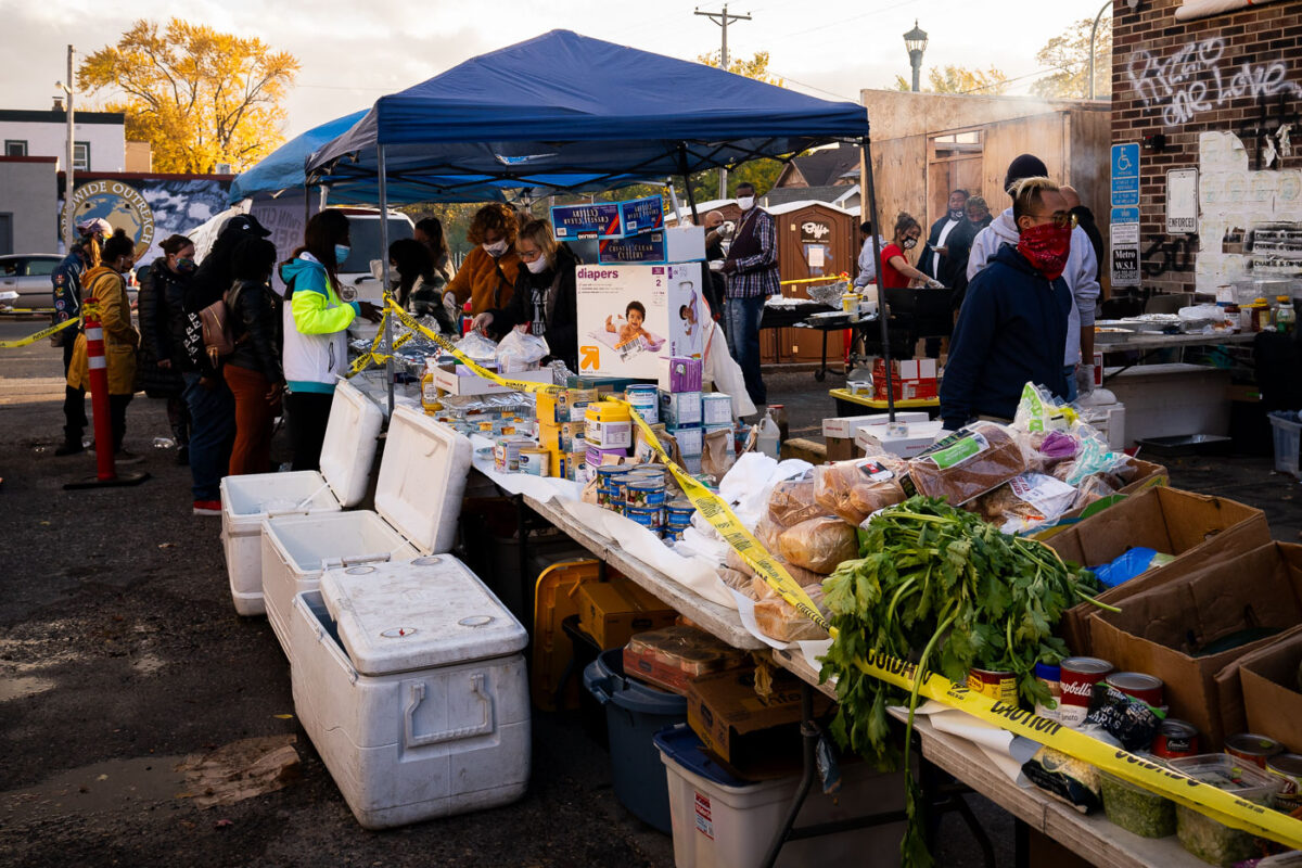 Food being offered to the community at George Floyd Square on what would have been George Floyd's 47th birthday.