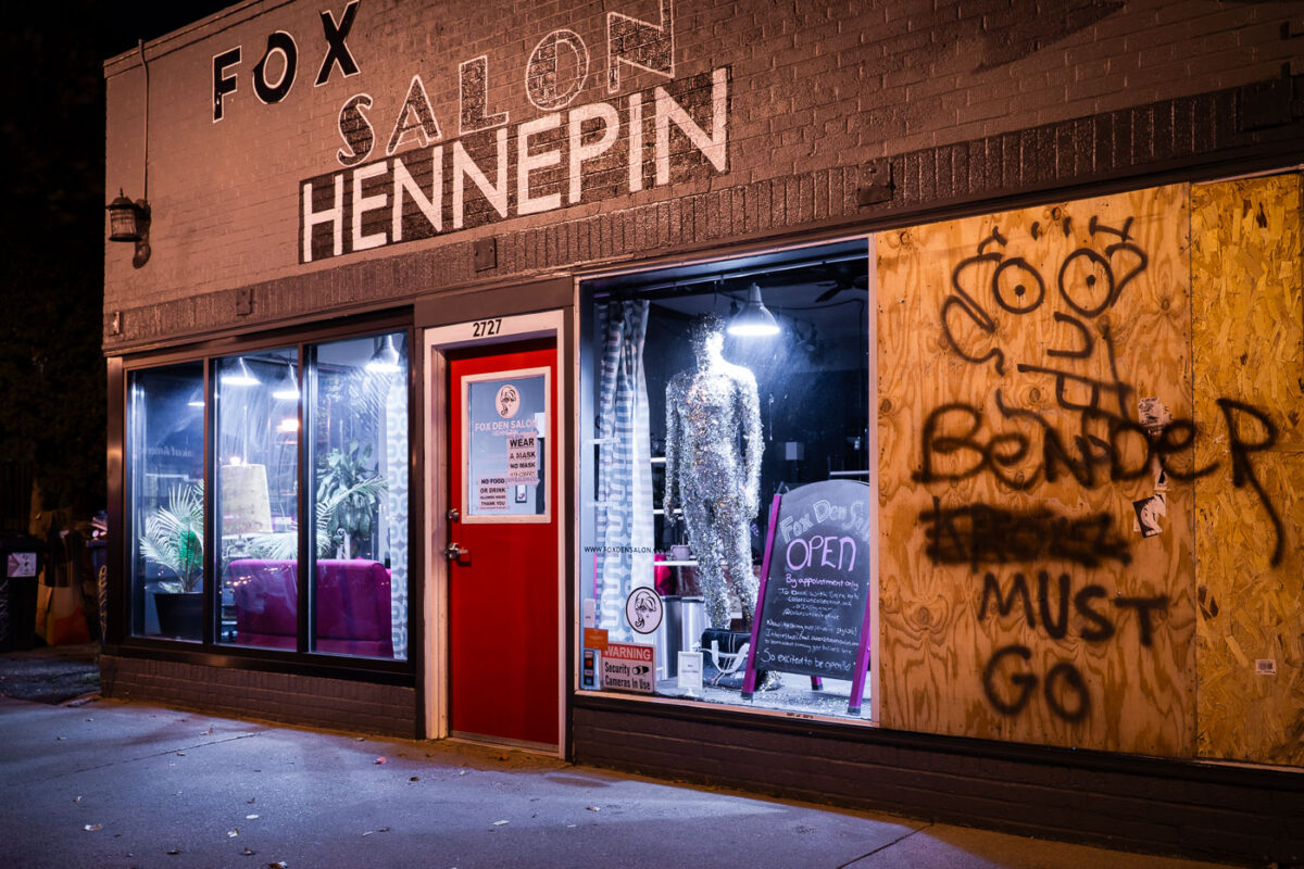 "Lisa Bender Must Go" written on a board on a retail shop on Hennepin Avenue. Lisa Bender is the Minneapolis City Council President.