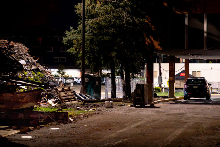 Police guarding burned Wells Fargo 1 A Minneapolis Police Officer under the burned out Wells Fargo Bank on Nicollet Ave. The bank sits across the street from the Fifth Precinct and was burned during unrest.