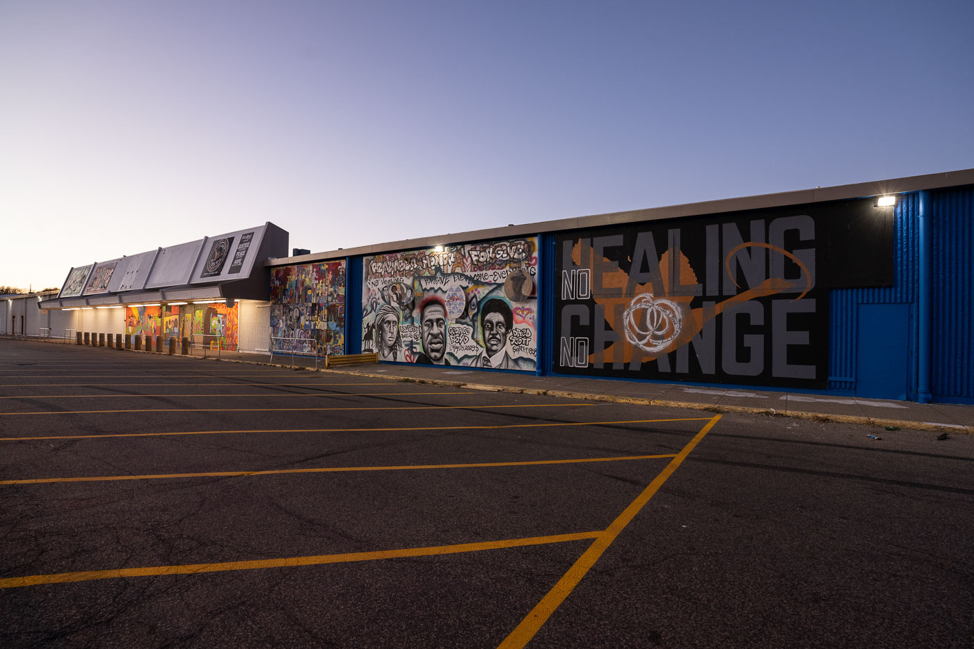 Murals on boards of the former k-mart