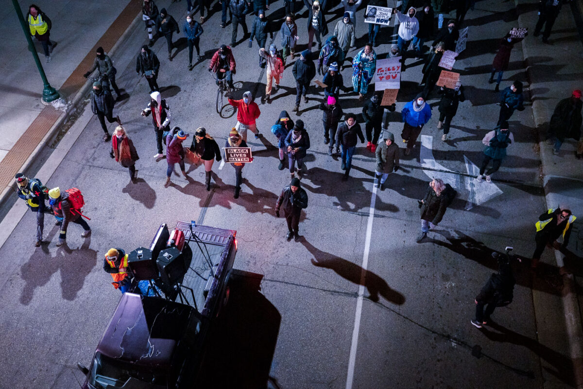 Toussaint Morrison leads a group of protesters down Lake Street in solidarity with Philadelphia after the killing of Walter Wallace.