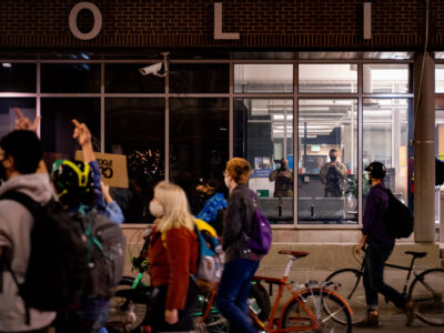 Protesters march past Minneapolis First Precinct after Chauvin release