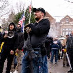 Armed “Proud Boys” at a “Stop The Steal” rally outside the Minnesota Governor’s mansion in St. Paul, Minnesota on November 14, 2020.