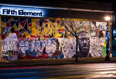 Boards over the windows of Fifth Element on Hennepin Ave.