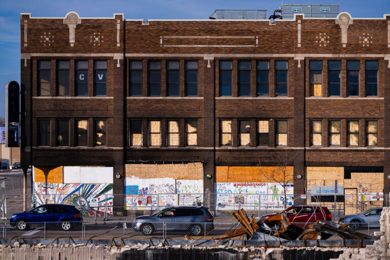 Coliseum Building with boards 2 The Coliseum Building on Lake Street as seen from across the street.
