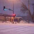 A riot damaged building in South Minneapolis during heavy snowfall.