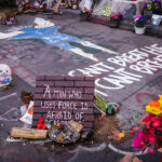 The site of George Floyd's death on the 6 month anniversary of his death. Located at 38th and Chicago Ave in Minneapolis.