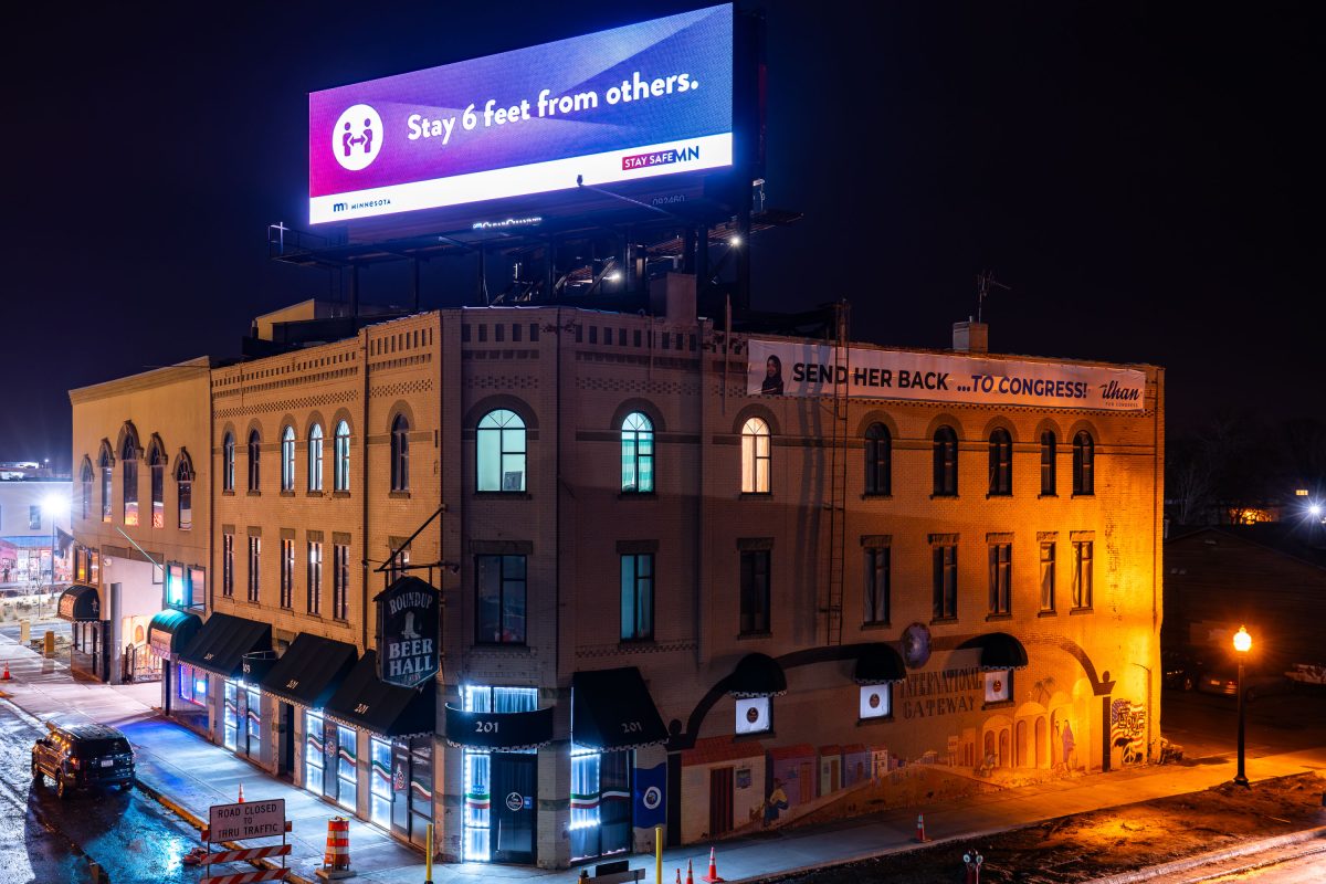 Ilhan Omar banner and COVID-19 Billboard