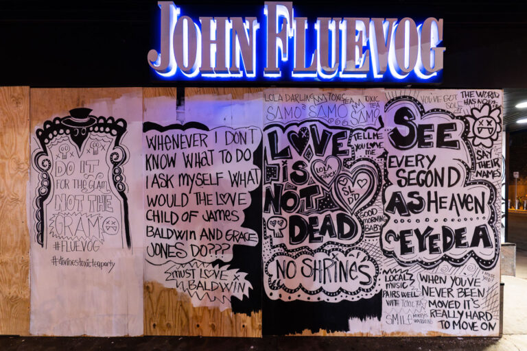 John Fluevog on Hennepin Ave 3 Art on boards covering the John Fluevog store on Hennepin Ave and Lagoon Ave in Uptown Minneapolis.