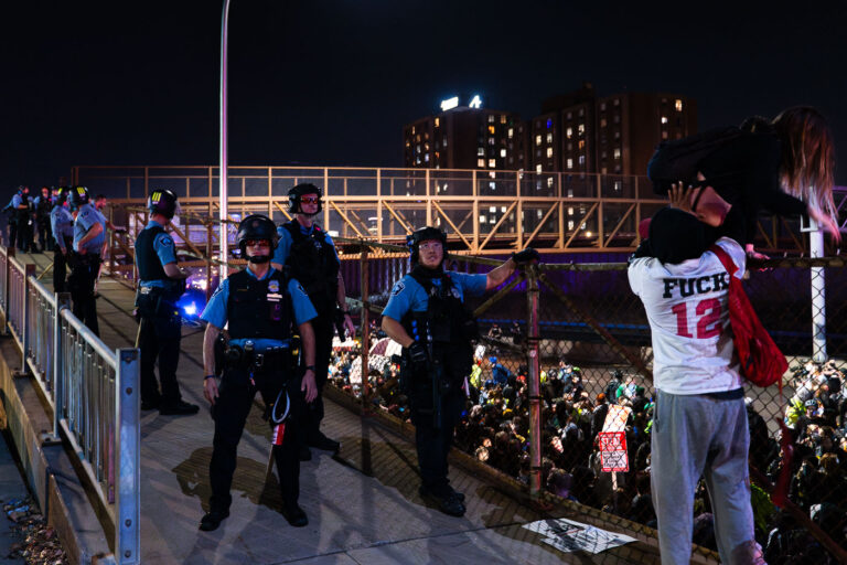 Minneapolis Police and protesters at the fence 4 Protesters demanding democracy march from Downtown Minneapolis and Cedar/Riverside onto I-94. 646 arrests were made in what is likely the largest mass arrest/citation event in city history.