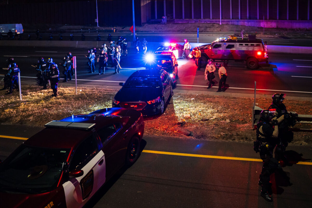 Police arrest 646 protesters in Minneapolis on Interstate 94 following a march down the freeway on the day after the election.