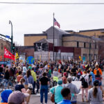 Protesters gather outside of the Minneapolis Police Third Precinct as part of a march shortly after Biden was announced winner of Donald Trump in the Presidential election.