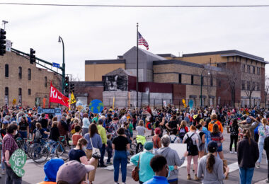 Protesters gather outside of the Minneapolis Police Third Precinct as part of a march shortly after Biden was announced winner of Donald Trump in the Presidential election.