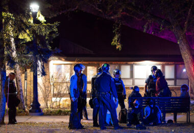 Minneapolis Police, Park Police and Hennepin County Sheriff officers arrest 14 after an election night protest through Uptown Minneapolis.