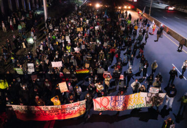 Protesters demanding democracy march on I-94. 646 arrests were made, the largest mass arrest event in Minnesota history.