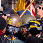 "Proud Boys" confront counter protesters outside the Minnesota Governor's Mansion where "Stop The Steal" protesters were holding a rally.