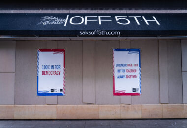 Signs on the side of Saks Off 5th Avenue in Downtown Minneapolis.