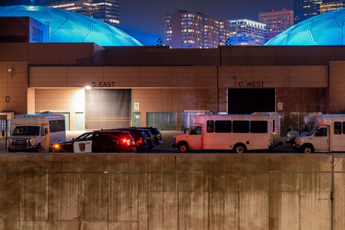 State Patrol and arrestee buses outside the Minneapolis Convention Center. The Convention Center is currently being used as a temporary home for the Minneapolis Police third precinct that was burned in May following the murder of George Floyd.
