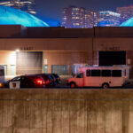 State Patrol and arrestee buses outside the Minneapolis Convention Center. The Convention Center is currently being used as a temporary home for the Minneapolis Police third precinct that was burned in May following the murder of George Floyd.