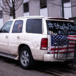 A truck with “Stop The Steal” and Qanon written on the windows found outside a “Stop The Steal” rally at the Minnesota State Capitol on November 14, 2020.