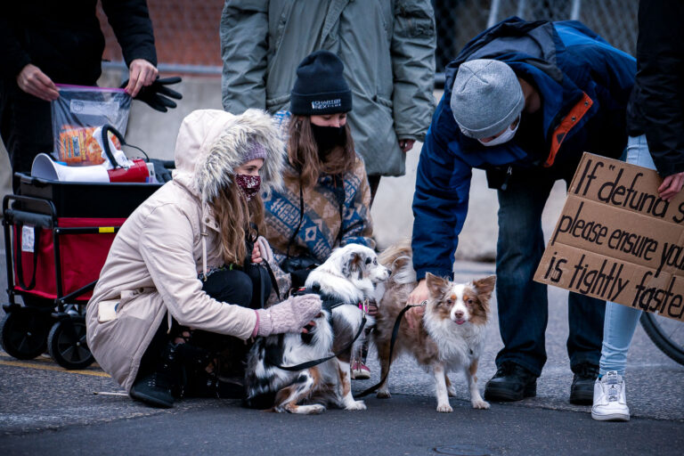 Dogs at a protest outside the St. Paul police department 3 Protesters marched the half mile from Wilder Playground to the St. Paul Police at Minnehaha & Payne where they heard from speakers on racial inequality and the need for defunding/abolishing the police.