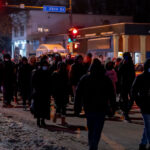 Protesters march down Cedar Ave a night after the Minneapolis police shoot and kill Dolal Idd. Minneapolis Police released video they say showed Dolal Idd shooting first through the window of his car during a firearm sting.