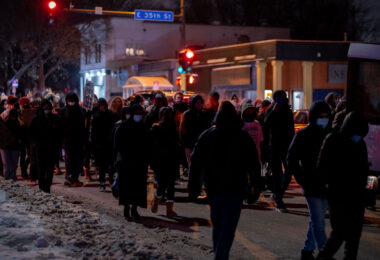 Protesters march down Cedar Ave a night after the Minneapolis police shoot and kill Dolal Idd. Minneapolis Police released video they say showed Dolal Idd shooting first through the window of his car during a firearm sting.
