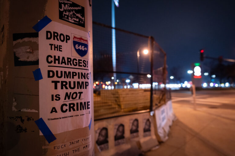 Dumping Trump Is Not a Crime 4 Flyers taped to a pole outside of the Minneapolis Third Precinct police station, which burned after the murder of George Floyd in May 2020. Drop the charges refers to the 646 that were criminally charged during the largest mass arrest in Minnesota history. Protesters were arrested after marching onto I-94 in a post election march.