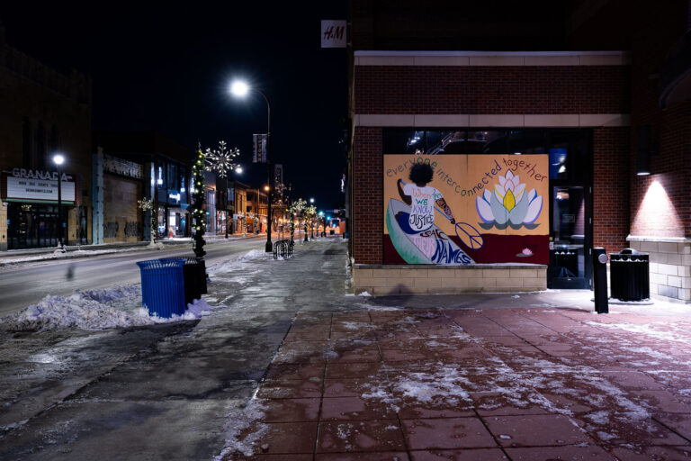 Everyone interconnected together mural 3 Boards and a mural on a H&M store on Hennepin Ave. in Uptown Minneapolis.