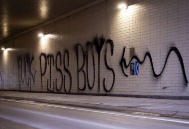 “Fuck piss boys” in a highway tunnel in St. Paul during a Proud Boys Stop The Steal rally on December 19, 2020.