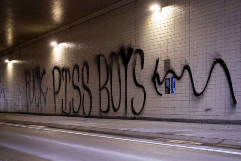 FUCK PISS BOYS 3 “Fuck piss boys” in a highway tunnel in St. Paul during a Proud Boys Stop The Steal rally on December 19, 2020.