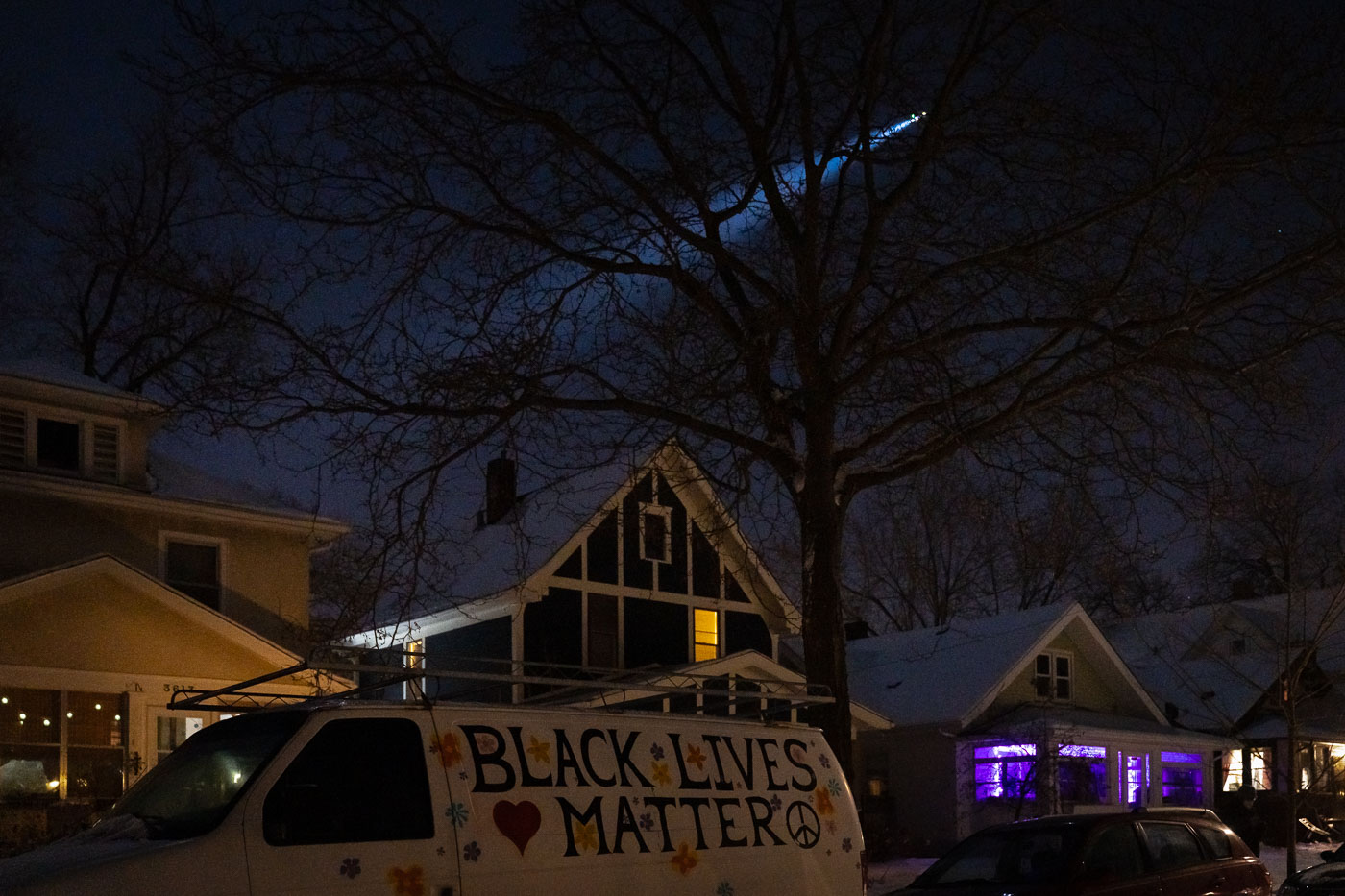 Helicopter over protesters outside 36th and Cedar Ave